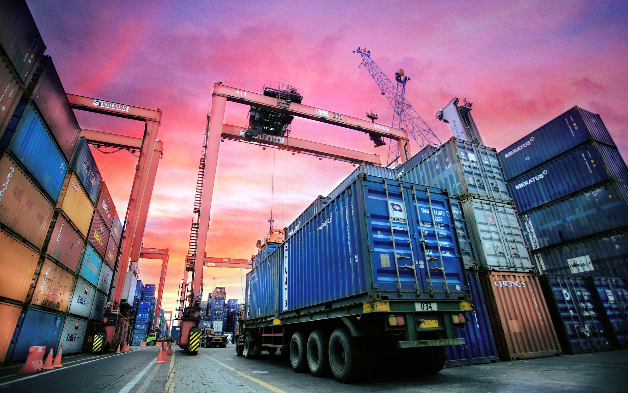 Shipping containers stacked at a Gulf port terminal